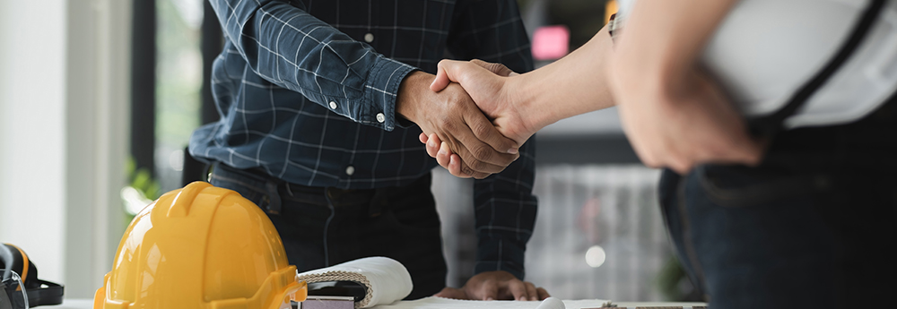 Two Engineers Shaking Hands